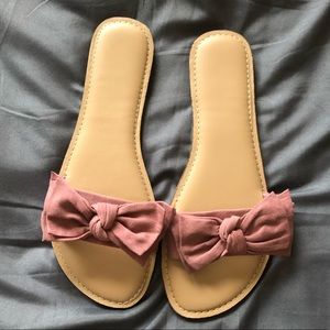 Pink bow sandals.